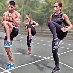 An energetic group performing a high-knee functional training exercise outdoors, showcasing coordination and strength.